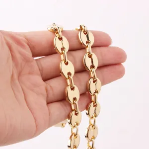 Gold coffee bean chain necklace, stylish stainless steel statement jewelry for daily wear.