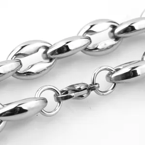 Close up detail of mens stainless steel coffee bean chain necklace metal link texture.
