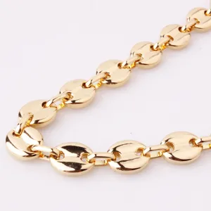 Gold coffee bean chain necklace detail, durable stainless steel hip-hop jewelry for men.
