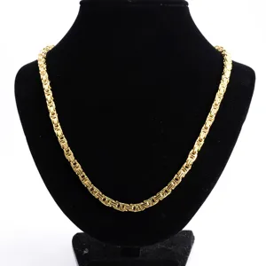 Detail shot of men gold stainless steel Byzantine chain necklace, sturdy hip hop jewelry link.