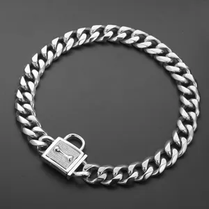 Detail shot of stainless steel heavy duty pet cuban link chain collar with secure lock.
