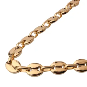 Detailed shot of gold stainless steel coffee bean chain necklace, fashion punk jewelry link.