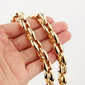 Detailed shot of thick gold coffee bean chain necklace for men, stainless steel jewelry.