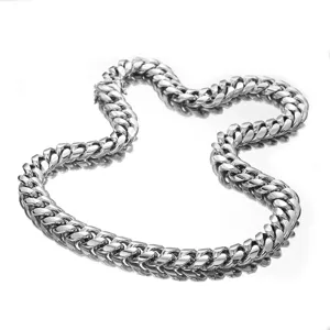 Detailed close-up of the silver Cuban chain link, showcasing polished stainless steel texture.
