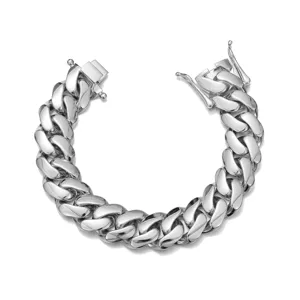 Close-up detail of the polished stainless steel Cuban link chain bracelet, sleek and modern.