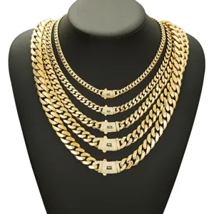 Gold-plated chunky cuban link chain necklace set with sparkling pavé rhinestone lock clasp.