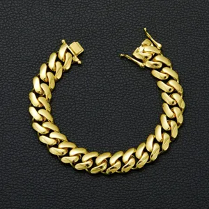 Gold Cuban chain detail showcasing the classic links and clasp design of this mens hip hop necklace.