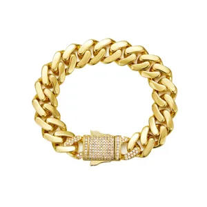 Gold stainless steel Cuban link chain necklace with iced out paved clasp for men hip hop.