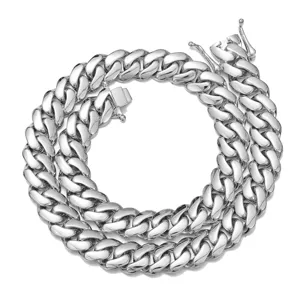 Stainless steel cuban link chain detail, polished silver finish, close-up view.