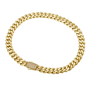 Close-up detail of 14K gold plated titanium steel hip hop Cuban link chain necklace with clasp.