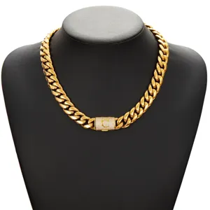 Gold hip hop Cuban link chain necklace for men with rhinestone letter clasp detail.