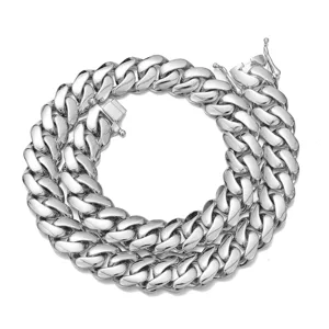 Detailed shot of men's stainless steel Cuban chain necklace with mirror polish finish.