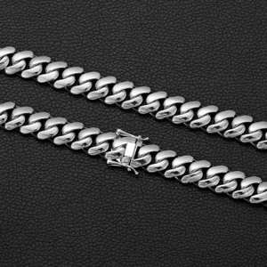 Close-up detail view of the stainless steel Cuban link chain necklace and secure box clasp.