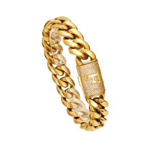 Men iced out Cuban link chain necklace with letter F clasp, gold hip hop jewelry detail view.