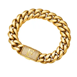 Men gold cuban link chain necklace with iced out letter F clasp hip hop jewelry detail.