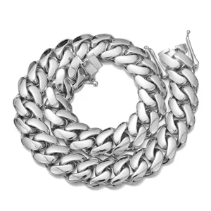 Men stainless steel Cuban chain necklace, mirror polished heavy silver metal link jewelry detail.