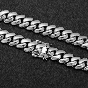 Men stainless steel Cuban link chain necklace, polished silver finish detail view.
