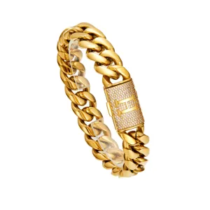 Close-up detail shot of the luxury gold cuban link chain showcasing a paved letter H clasp.