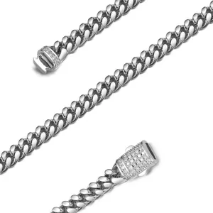 Detailed view of men's stainless steel Cuban link chain necklace with paved crystal clasp.