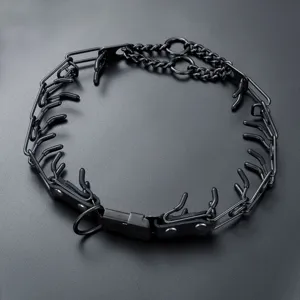 Durable black stainless steel dog prong training collar with secure quick release buckle.