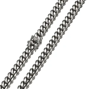 Detailed shot of a sleek stainless steel Cuban link chain with a secure clasp for hip hop style.