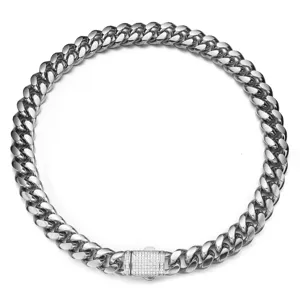 Stainless steel Cuban link chain necklace detail showing rhinestone paved box clasp design.