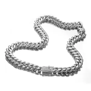 Close-up detail of the stainless steel Cuban chain necklace featuring a paved sparkle clasp.