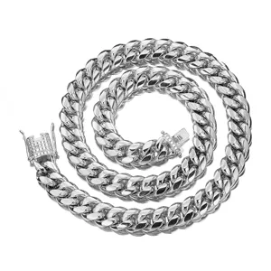 Stainless steel Miami Cuban link chain necklace with micro-pave diamond clasp detail.