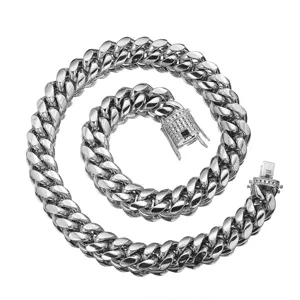 Detailed close-up of stainless steel Miami Cuban link chain with iced out crystal clasp.