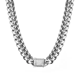 Stainless steel Cuban link chain necklace with micro pave diamond clasp, jewelry detail view.