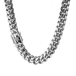 Stainless steel cuban link chain close-up, heavy hip hop silver metal necklace detail view.