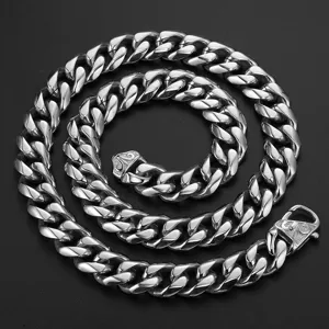Close-up detail of the heavy stainless steel cuban link chain showing polished texture.