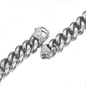 Detailed shot of thick 15mm stainless steel Cuban link chain necklace with carved clasp.
