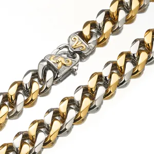 Detail view of 15mm two-tone cuban link chain necklace with ornate clasp design.
