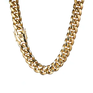 Detail view of the heavy gold Cuban link chain, showing the secure clasp and polished texture.