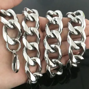 Detail view of men heavy thick stainless steel hip hop curb chain necklaces in silver finish.