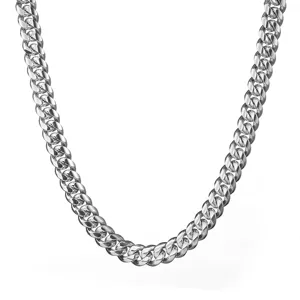 Detailed close-up of heavy silver stainless steel cuban link chain necklace, hip hop.