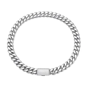 Stainless steel cuban link chain necklace detail view featuring a sparkling pave zircon clasp.