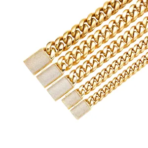 Close-up detail of iced out Cuban link chain with paved cubic zirconia lock clasp, gold plated.