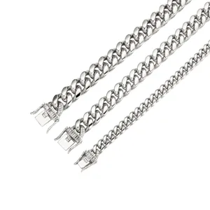 Stainless steel Cuban link chain necklace set featuring sparkling zircon clasps for men.
