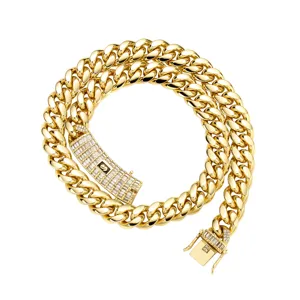 Gold Cuban chain necklace, stainless steel hip hop jewelry with cubic zirconia clasp detail.