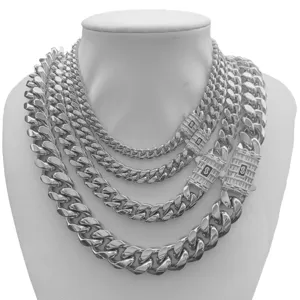 Detailed view of men stainless steel silver color Cuban link chain necklace with stones