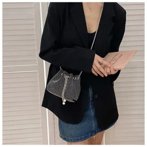 Sparkling rhinestone drawstring bucket bag with pearl charm and chain strap