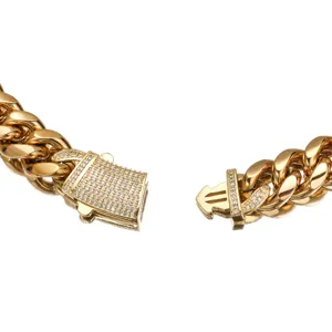 Gold stainless steel Cuban link chain clasp detail view, iced out micro pave rhinestone lock.