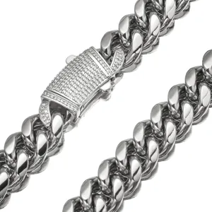 Men's stainless steel cuban link chain necklace detail showing the paved crystal box clasp.