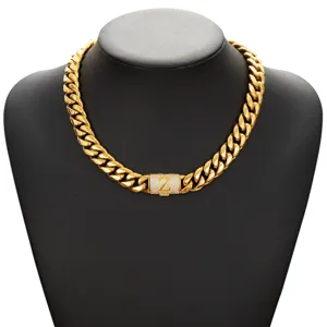 Detailed view of the gold hip-hop Cuban link chain necklace featuring an iced-out letter Z clasp.