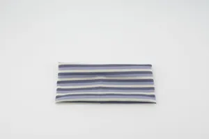Detailed view of striped elastic knitted headband, soft texture for sports yoga hair accessories