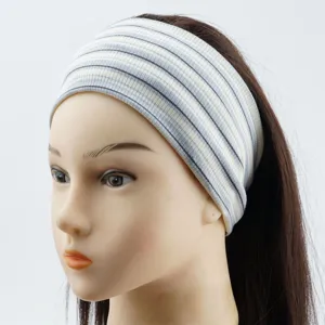Detailed view of the striped knitted yoga headband, wide elastic hair band for women.