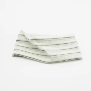 Detailed view of the wide striped knit headband, showing soft texture and elastic green stripes.