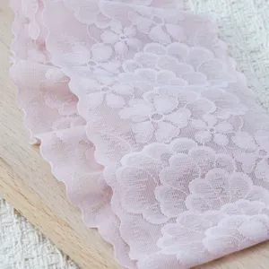 Pink floral lace trim detail, elastic wavy edge fabric for DIY headbands and accessories.